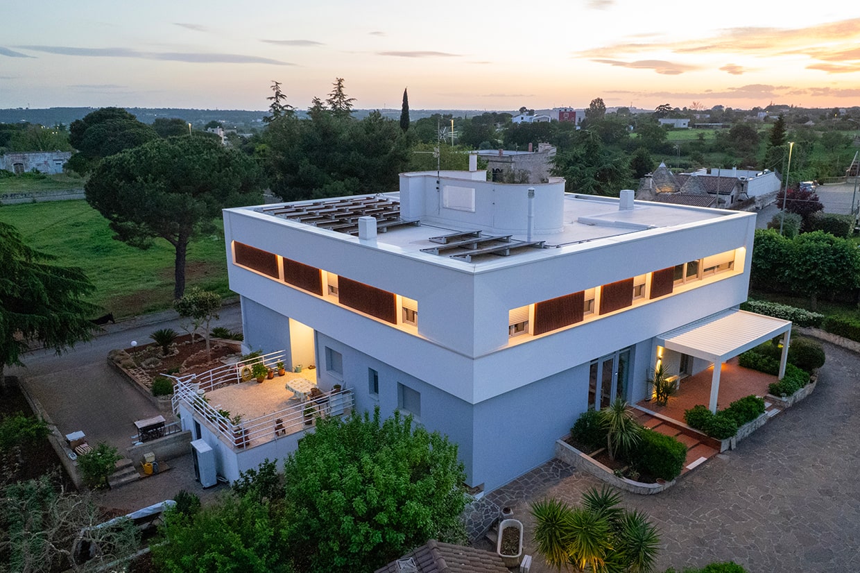 Progetto costruzione casa esterno notturno - Lovece