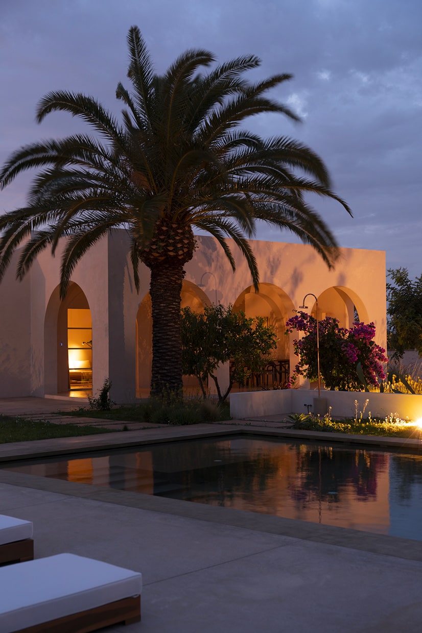 Progetto Casa Caroseno vista esterna con piscina notturna - Lovece